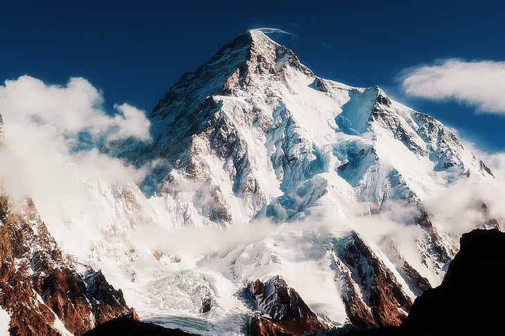 Remote alpine peaks beneath an expedition sky